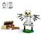 Kit LEGO avec hibou sur panneau 'Privet Drive' et coffre au trésor. Convient aux enfants de 7 ans et plus, contient 337 pièces.