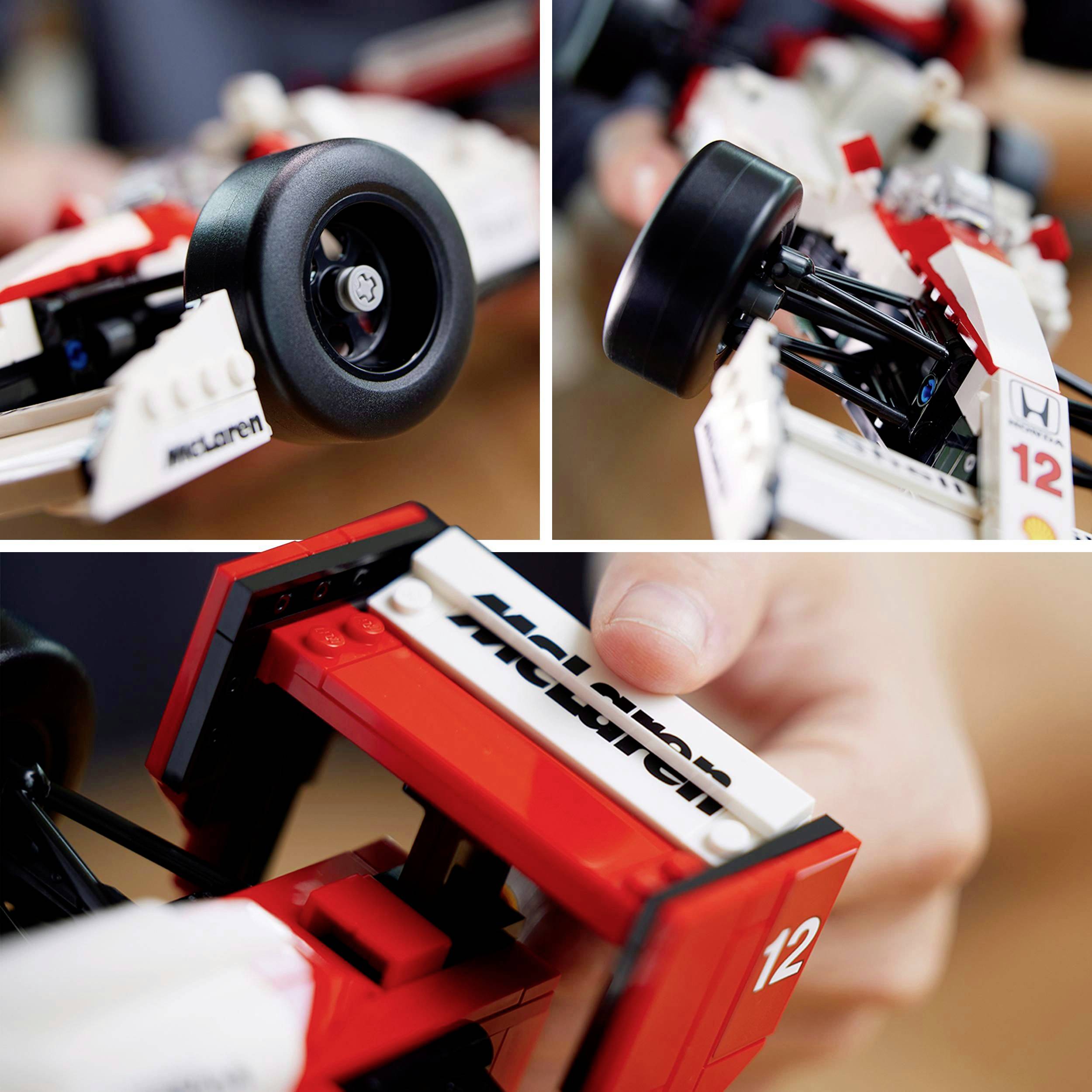 Gros plan sur une voiture de course miniature avec des détails blancs et rouges et le numéro 12, fabriquée par McLaren.