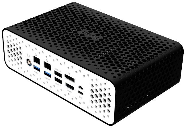 Un ordinateur compact doté de nombreux ports, dont USB 3.0, USB-C et HDMI, sur une façade avant blanche perforée.