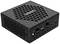 Mini-PC noir compact avec boîtier perforé et plusieurs ports à l'arrière. Principaux ports : HDMI, DisplayPort, USB.