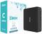 'ZOTAC ZBOX Série C Mini-PC', indique un emballage à côté de l'appareil. Le mini-PC dispose d'un boîtier nervuré noir.