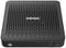 Un mini-PC noir avec un motif alvéolé sur le dessus. Le logo 'ZOTAC' est placé de manière centrale. La façade est dotée de boutons et de connecteurs.