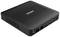 Ordinateur compact noir avec le logo 'Zotac' sur le dessus. Il dispose de fentes d'aération et de différents ports sur le côté.