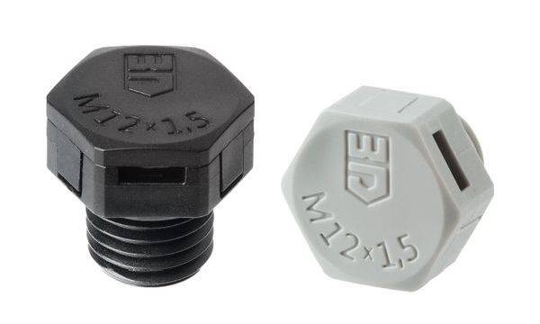 Deux capuchons de vis hexagonaux, un noir et un gris, portant la mention 'M72 x 1.5', disposés côte à côte à droite et à gauche.