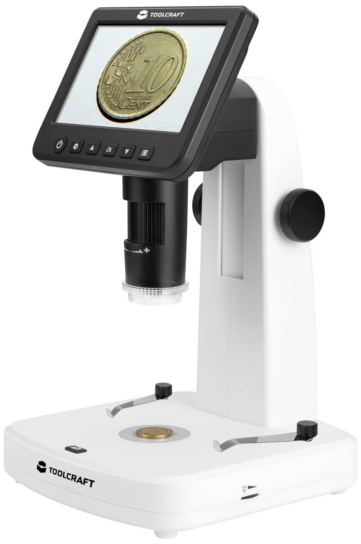 Un microscope numérique affiche une vue agrandie d'une pièce de 10 centimes sur l'écran.