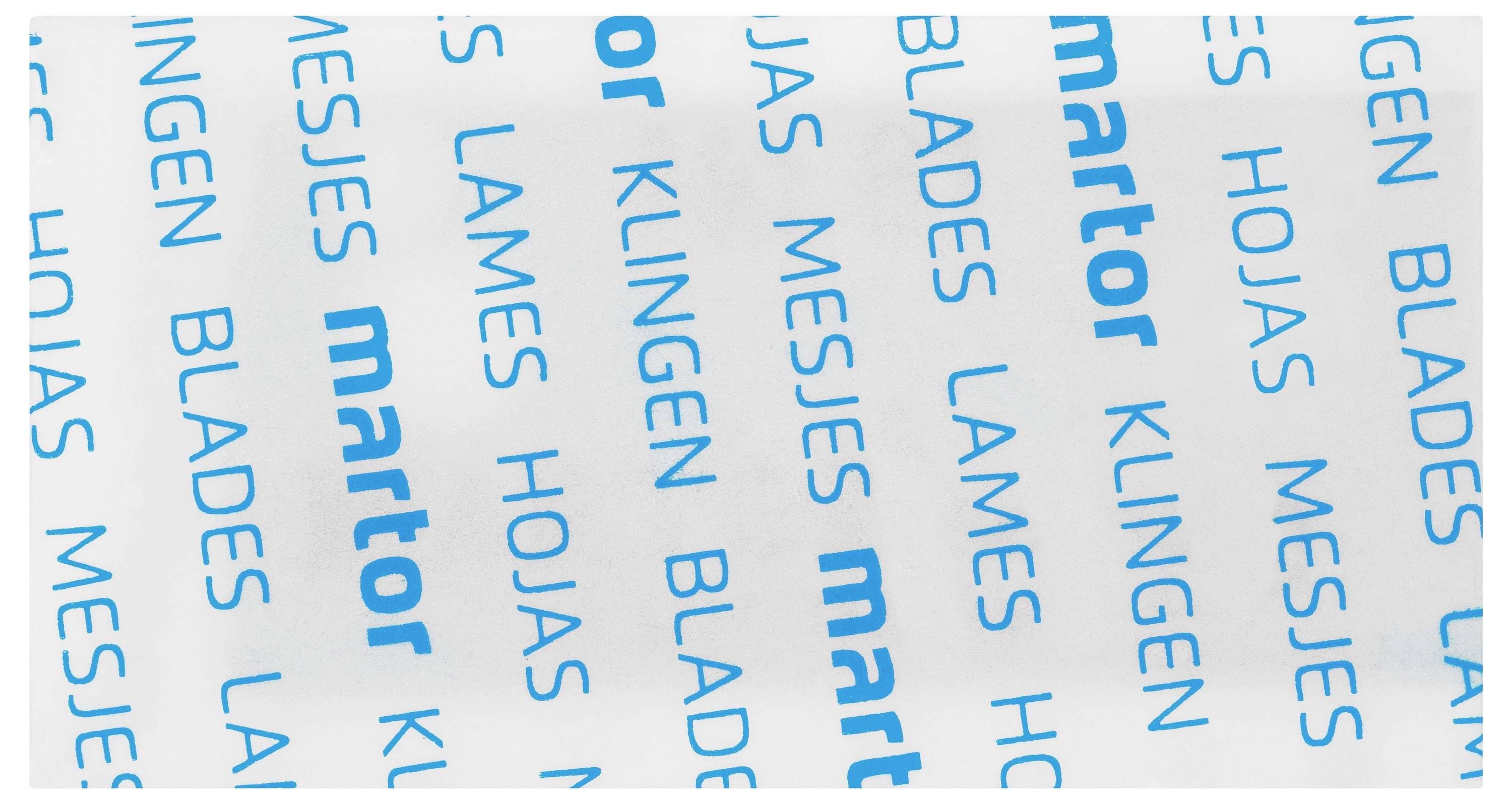 Emballage de lame 'Martor' avec indication multilingue : lames en anglais, espagnol, français, néerlandais et allemand.
