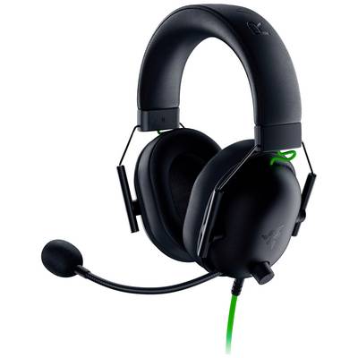 Un casque gaming noir avec microphone, bandeau rembourré et touches vertes, adapté aux jeux PC et à la communication.