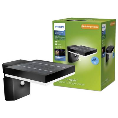 Lampe murale Philips UltraEfficace alimentée par l'énergie solaire avec panneau rectangulaire noir et capteur de mouvement, présentée à côté de sa boîte de produit verte.