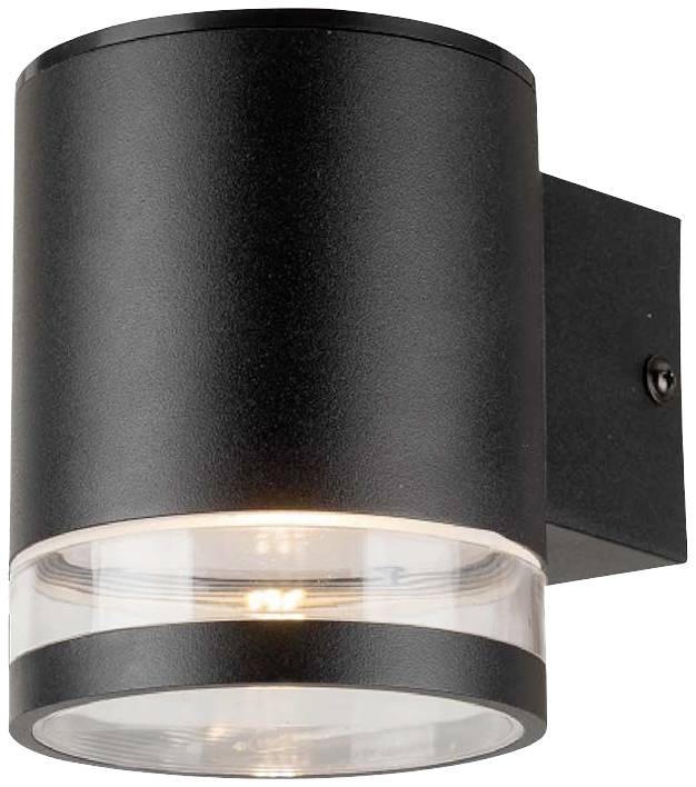 Un applique murale noir cylindrique avec un fond en verre transparent, qui diffuse une source lumineuse vers le bas.