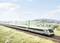 Un train à grande vitesse moderne circule sous le soleil à travers un paysage verdoyant. Des collines et un ciel bleu sont visibles en arrière-plan.