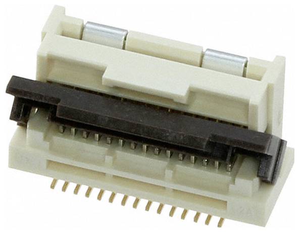 Gros plan d'un connecteur électrique beige avec plusieurs broches dorées et un loquet noir sur le dessus.