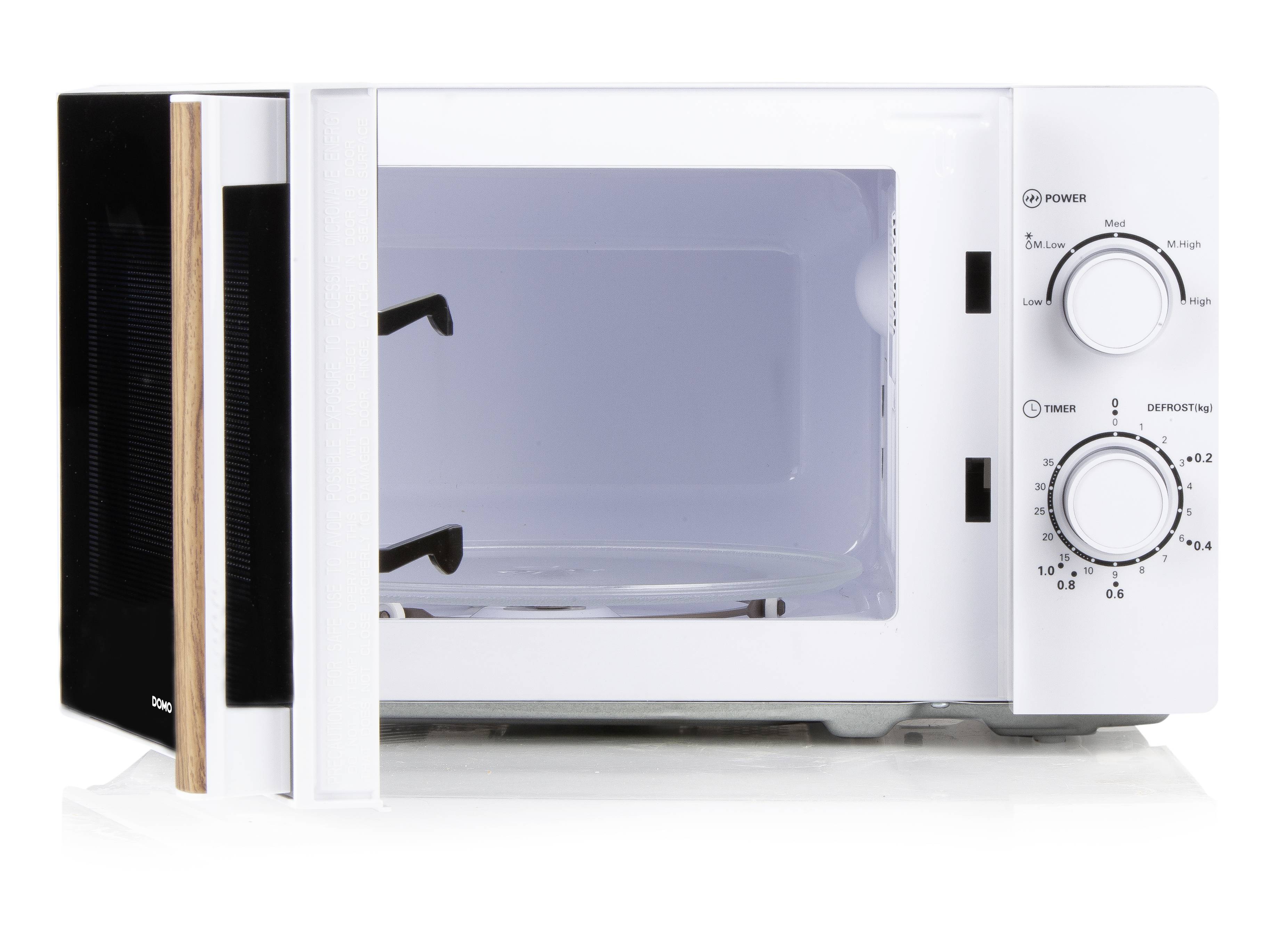 Un four micro-ondes blanc avec la porte ouverte montre son intérieur. Deux boutons rotatifs sur le côté droit permettent de régler la température et le temps.