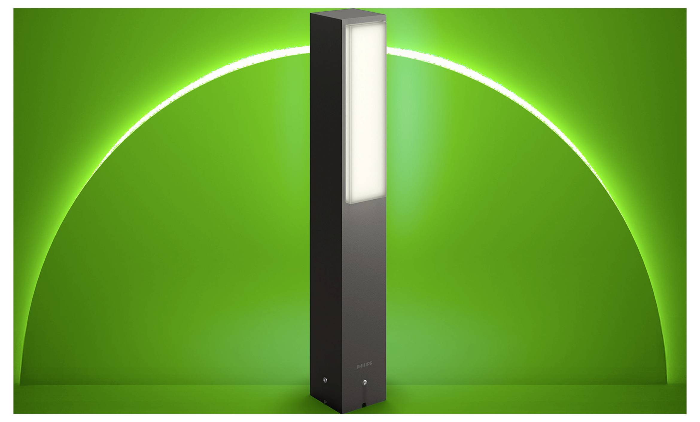 Luminaire rectangulaire noir de grande taille avec un panneau blanc brillant, positionné au centre sur un fond vert lumineux avec un grand halo circulaire.