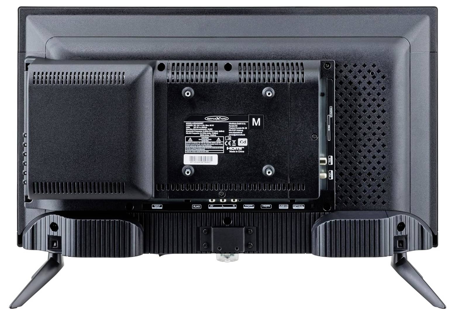 Vue arrière d'un téléviseur écran plat avec ouvertures de ventilation, ports d'entrée et pieds de support attachés.