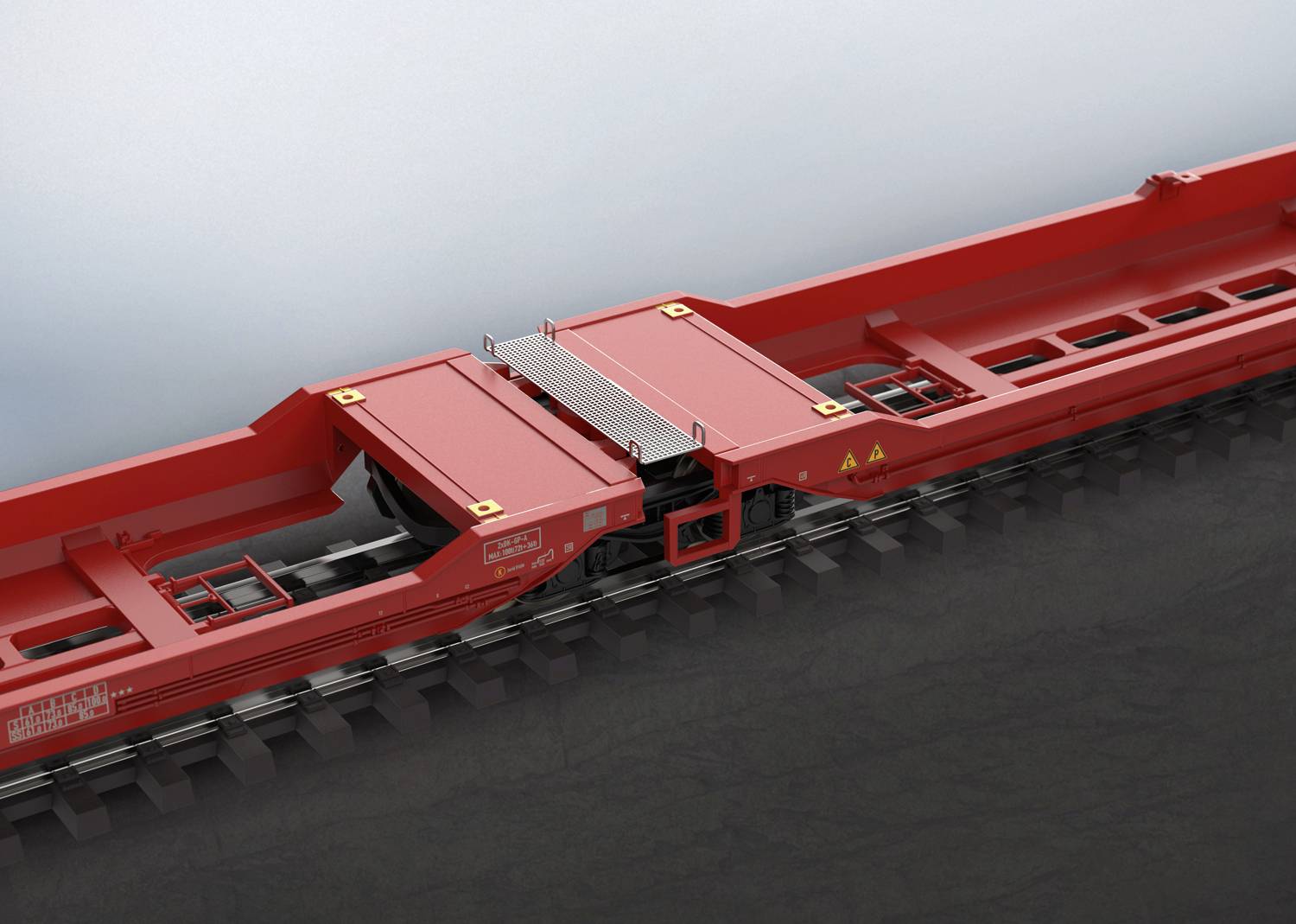 Wagon de chemin de fer rouge sur des rails, avec un focus sur le mécanisme de connexion entre les wagons.