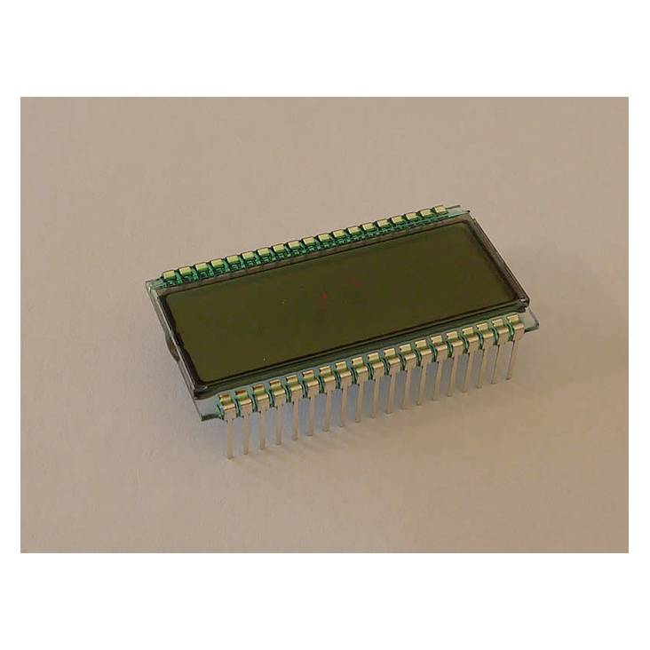 Un écran LCD rectangulaire vert posé sur une table, entouré de connexions argentées, prêt à être intégré dans des appareils.