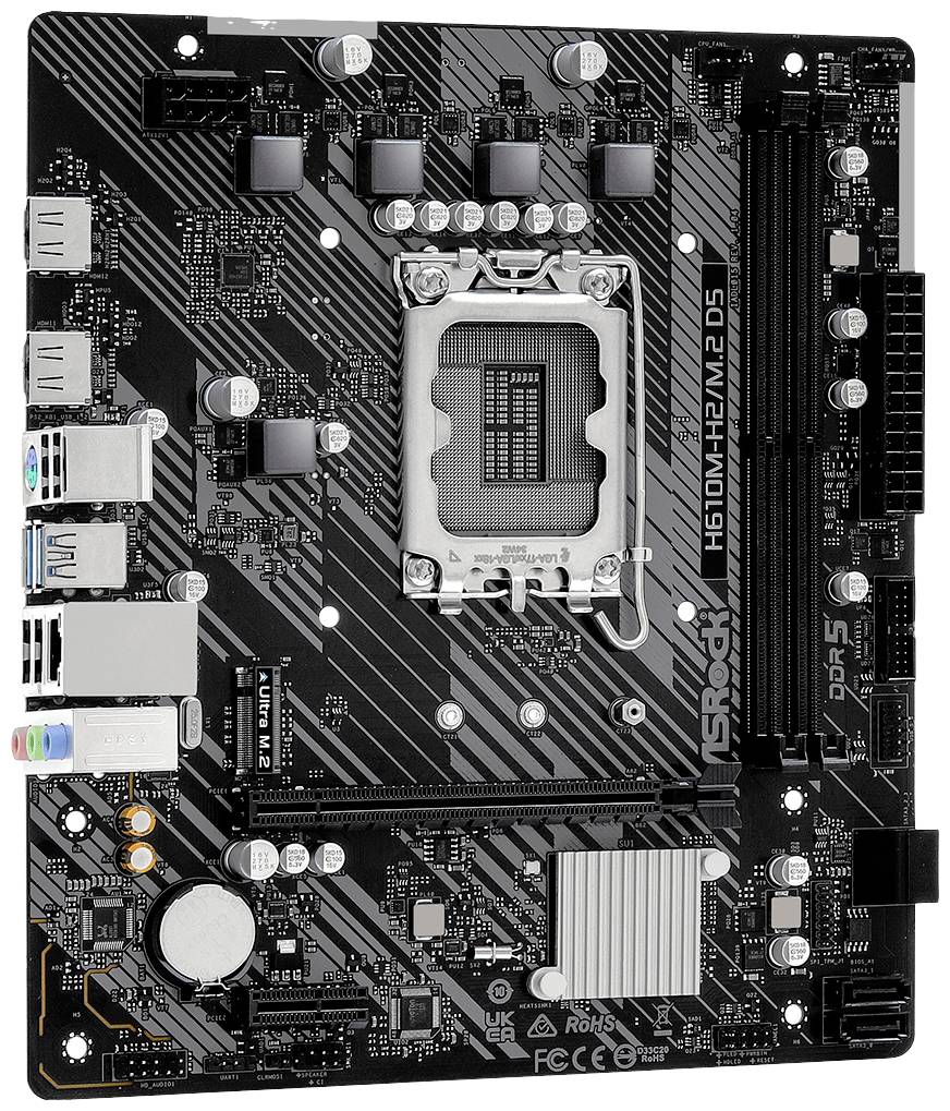 Une carte mère noire avec un socket CPU au centre, plusieurs condensateurs et des emplacements pour modules RAM.