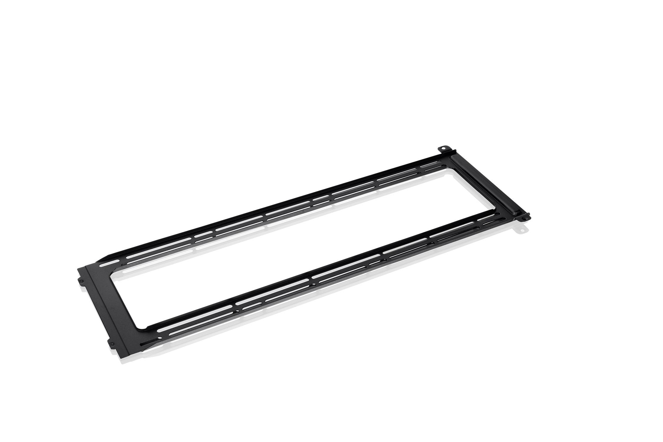 Un cadre rectangulaire en plastique noir, placé horizontalement, avec plusieurs entretoises intérieures, sur un fond blanc.