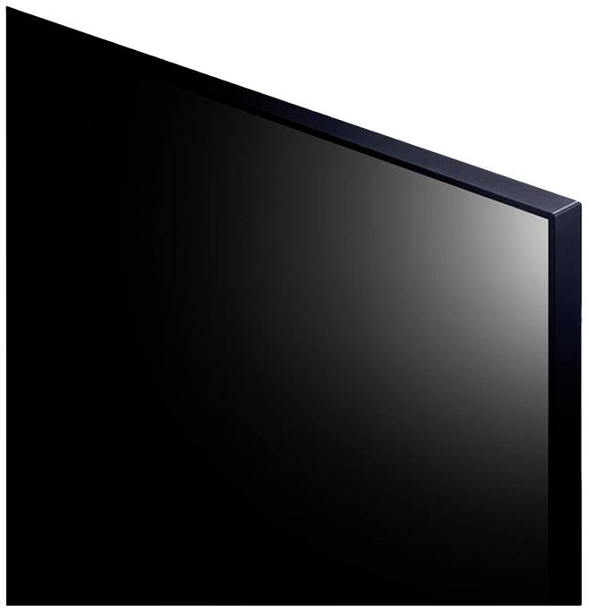 Gros plan du bord d'un écran ou d'un panneau rectangulaire noir. L'image montre uniquement la surface lisse et brillante.