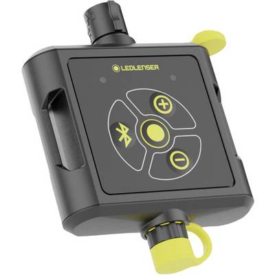 Un appareil électronique noir et jaune avec logo, boutons pour augmenter et diminuer les réglages et symbole Bluetooth.