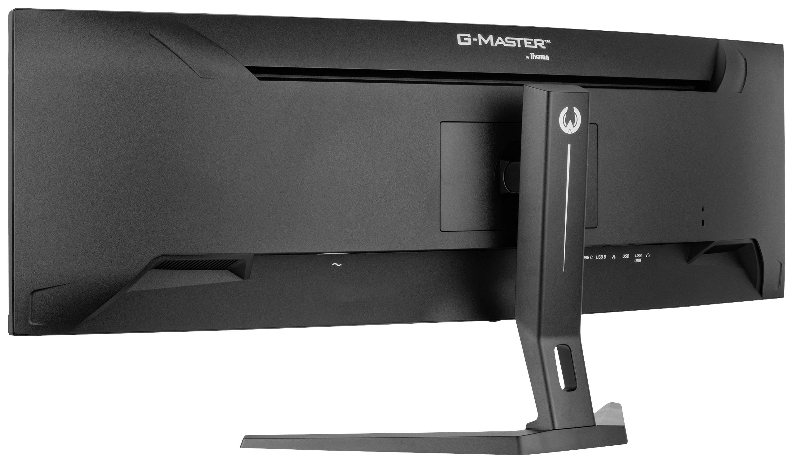 Un moniteur ultra-large sur un support, vue arrière, marque 'G-MASTER' indiquée.