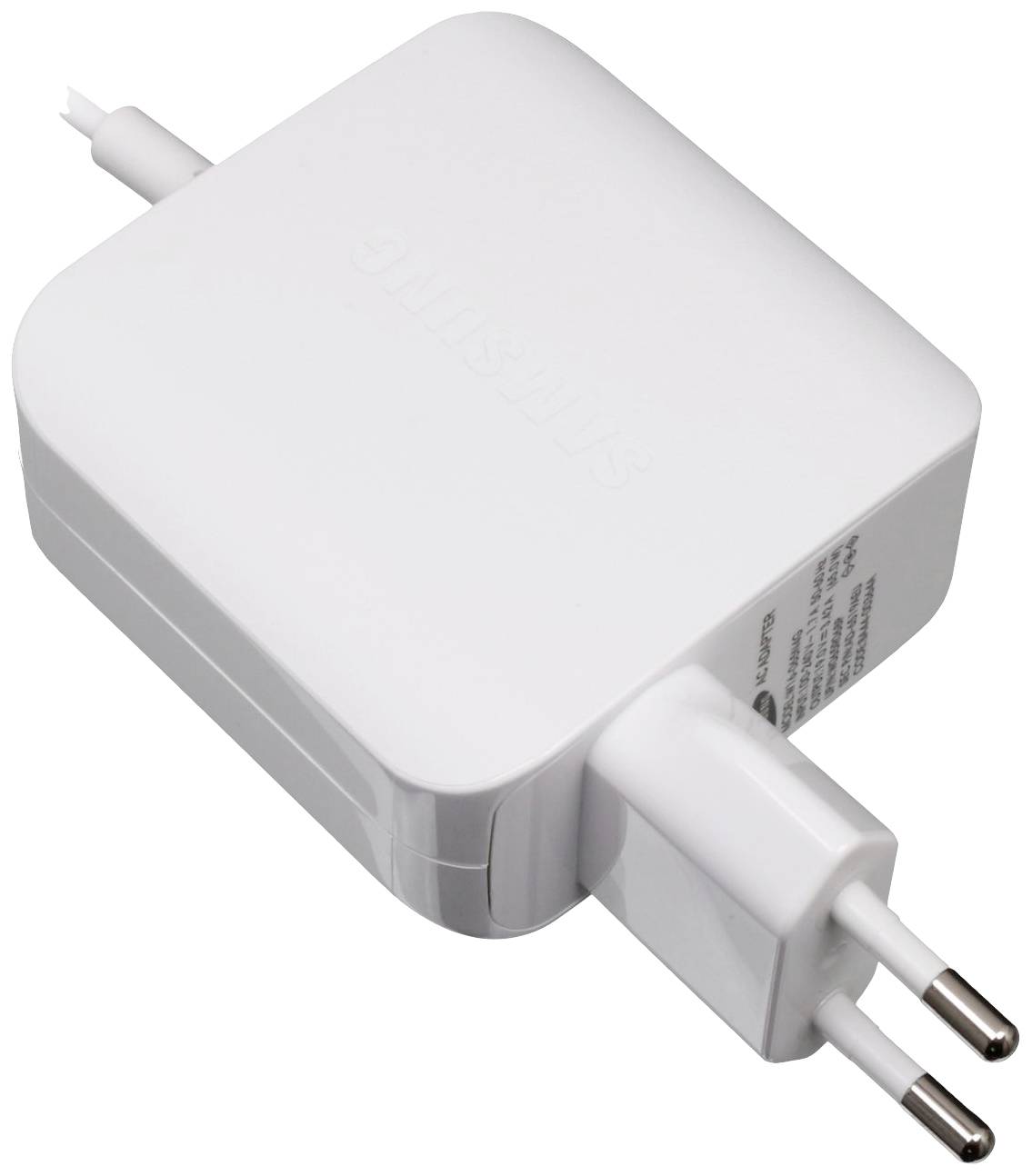 Un chargeur blanc avec une prise européenne pour un appareil électronique, vue de côté.