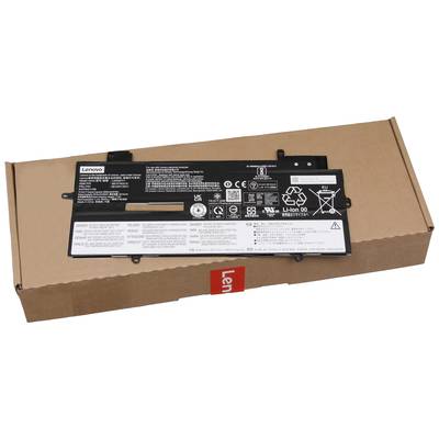 Un ordinateur portable Lenovo repose sur un emballage brun. La batterie affiche des informations techniques et des avertissements de sécurité.