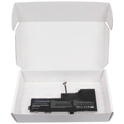 Un bloc-batterie de remplacement est ouvert dans un emballage en carton blanc. La batterie est noire avec de petites étiquettes et un câble de connexion.