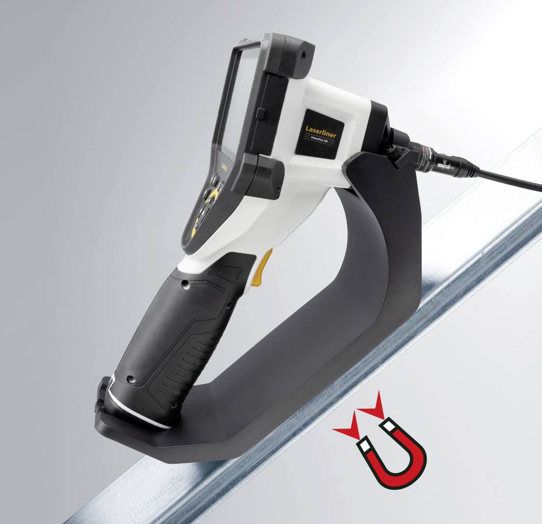 L'appareil de mesure numérique est posé sur une tige métallique ; il s'agit d'un appareil Laserliner avec un câble branché. Un symbole d'aimant est à côté.