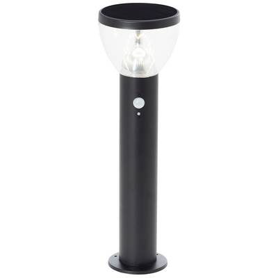 Lampadaire extérieur noir avec un diffuseur rond et transparent, reposant sur un socle cylindrique élevé. Capteur de mouvement intégré visible.