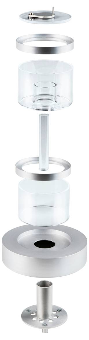 Vue éclatée d'une construction en métal et en verre avec des composants circulaires disposés verticalement, révélant sa structure interne.