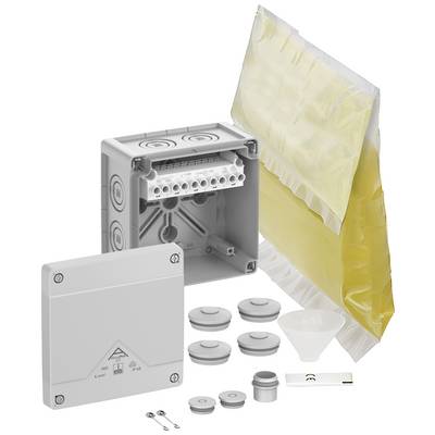 Boîte de connexion électrique avec accessoires tels que serre-câbles, capots et matériau isolant, fournie pour des besoins d'installation.