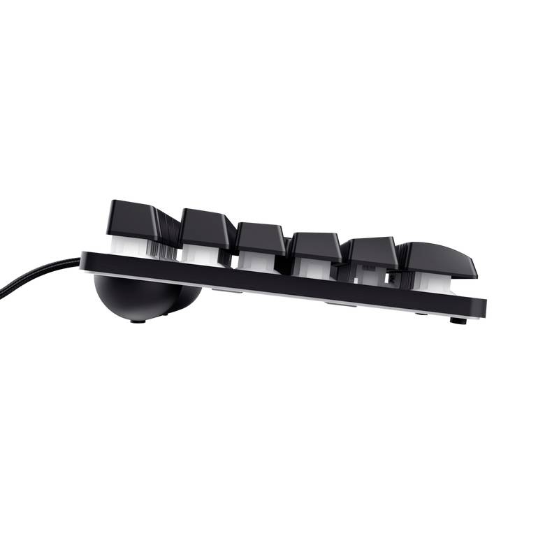 Vue latérale d'un clavier d'ordinateur noir avec des touches bombées surélevées dans un design amorti.