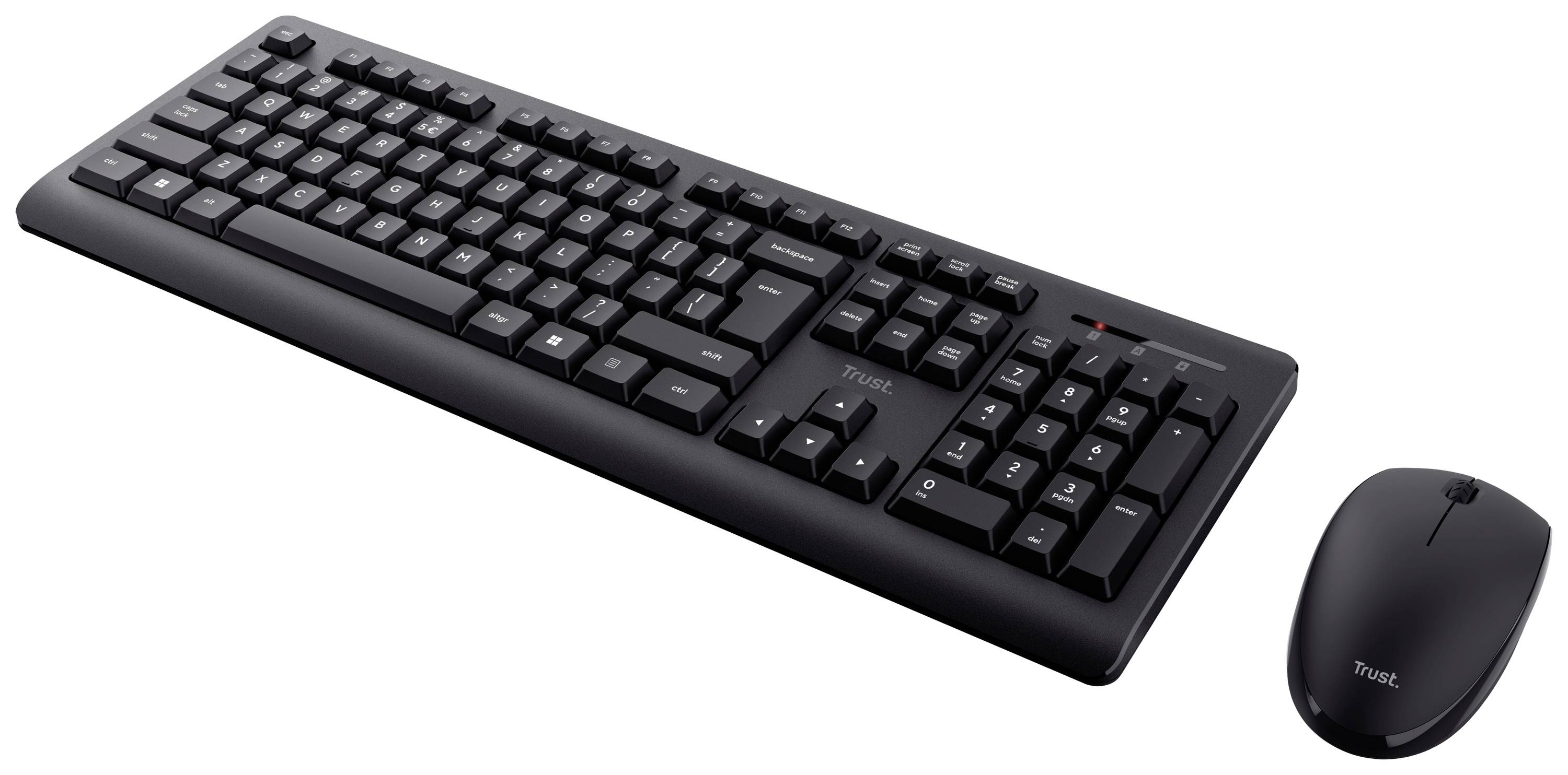 Clavier d'ordinateur noir et souris sans fil sur fond blanc. Les deux appareils présentent un design épuré.