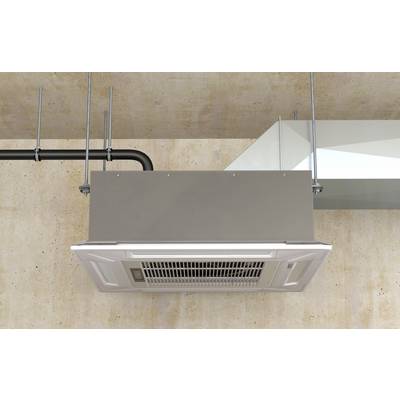 Hotte de cuisine montée au plafond avec conduit et tuyauterie apparente contre un mur beige.