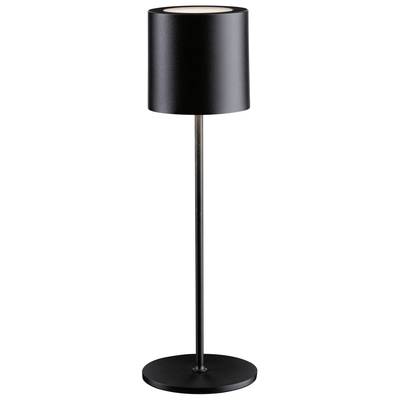 Lampadaire avec abat-jour noir et pied élancé, adapté à un intérieur moderne.