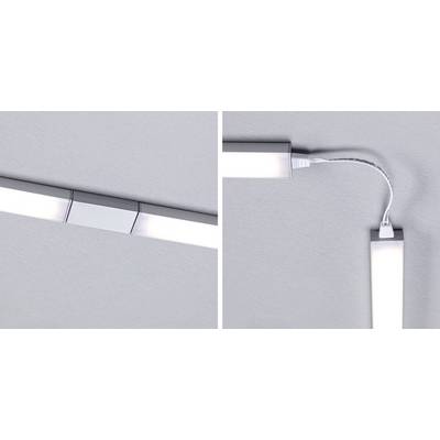 Des luminaires LED au plafond, reliés par un câble flexible, offrent une solution pour éclairer les coins ou les zones de transition dans un aménagement lumineux.