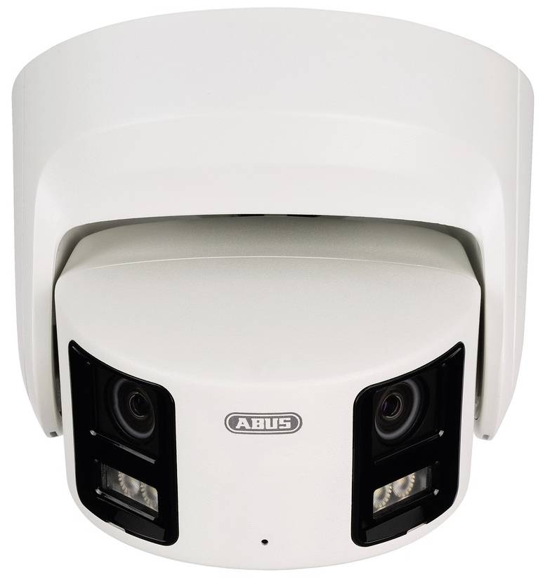 Caméra de surveillance à double objectif avec lampes LED sur boîtier blanc, installée pour la surveillance des espaces intérieurs ou extérieurs.