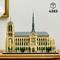 Un modèle LEGO d'une cathédrale gothique, avec des tours détaillées, une rosace et une flèche élancée, numéro de référence '4383'.