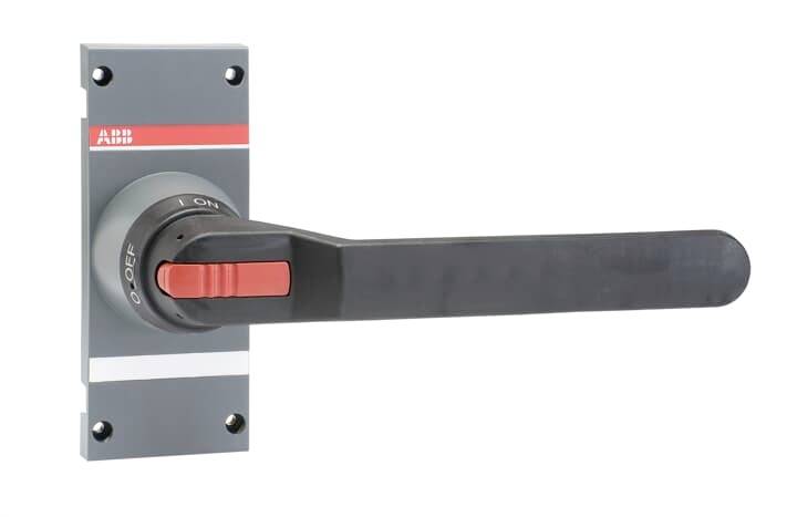 Un commutateur rotatif avec un levier noir sur une plaque grise. Le commutateur possède des positions 'I' et 'O', signifiant respectivement marche et arrêt.