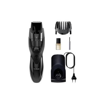 Un tondeuse à cheveux électrique noir avec chargeur, guide de coupe pour barbe, flacon d'huile et brosse de nettoyage.