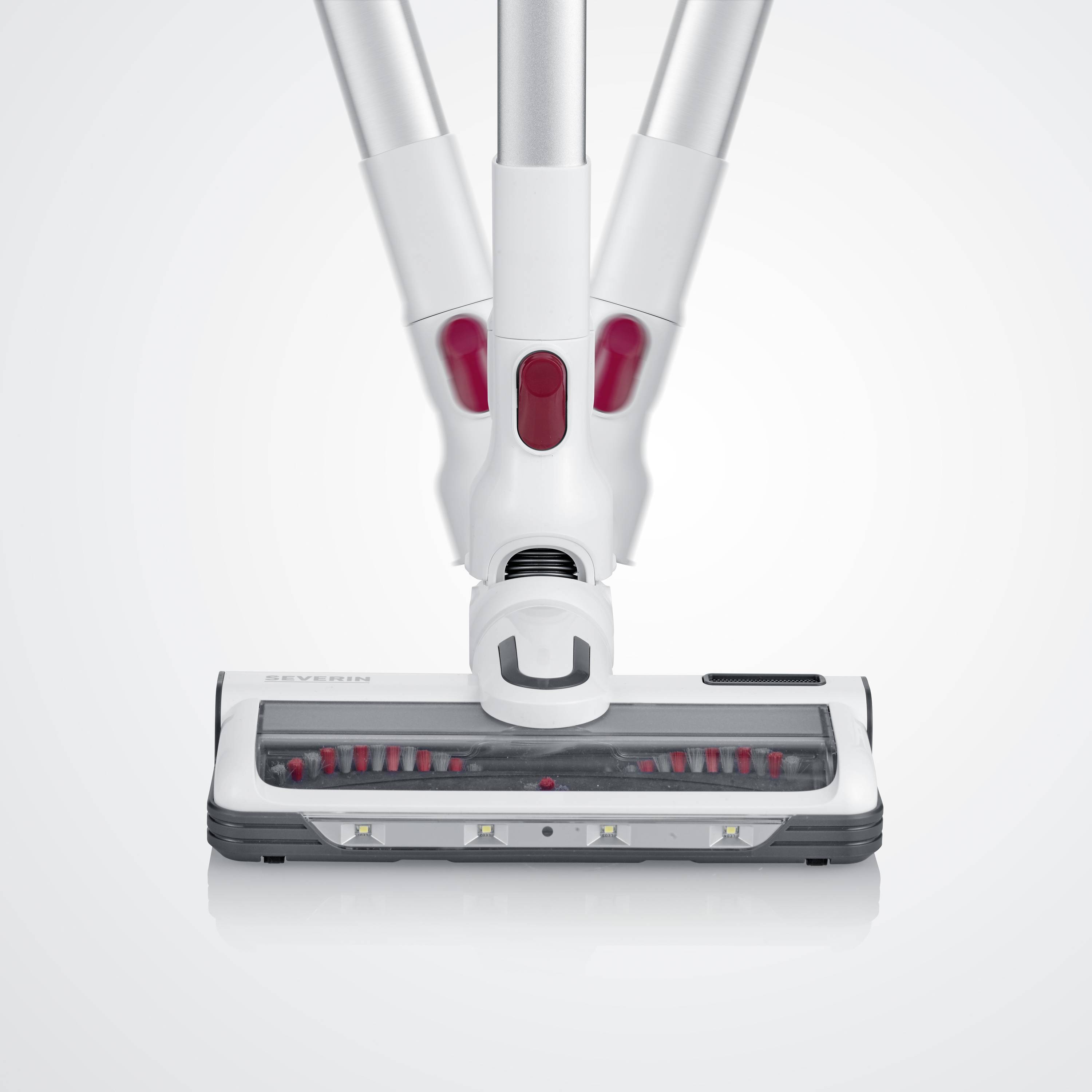 Un aspirateur blanc avec un détail rouge, doté d'une buse d'aspiration fine et d'un design autonome, sur un fond neutre.