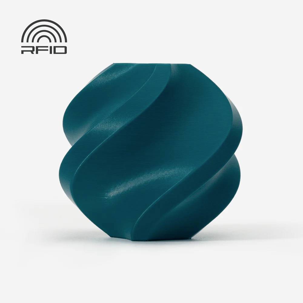 Un objet turquoise en forme de spirale sur un fond blanc. En haut à gauche, on peut lire 'RFID' accompagné d'un symbole d'onde stylisé.
