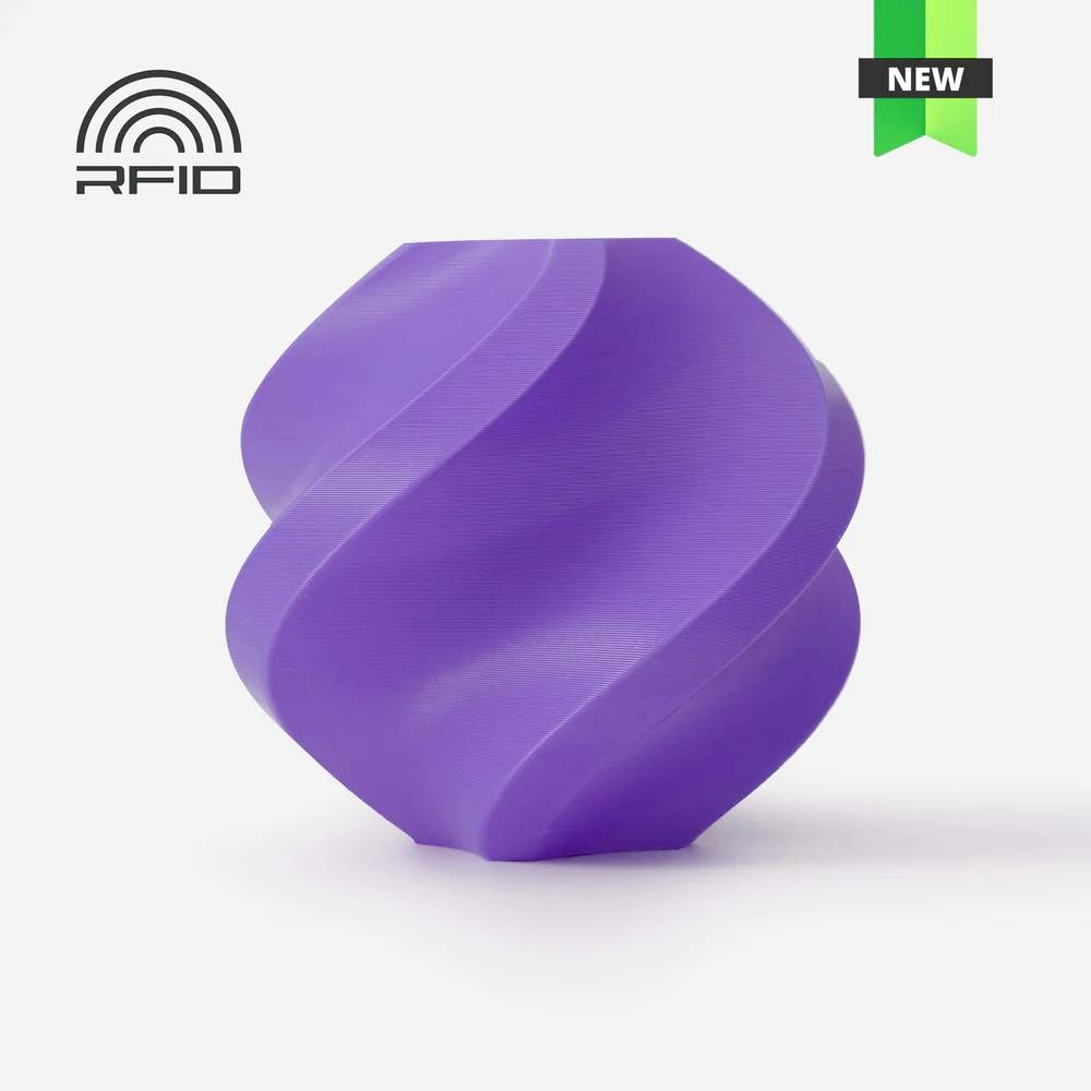 Lila, ballon recourbé avec le logo RFID à gauche ; un ruban vert en haut à droite portant l'inscription 'NEW'.