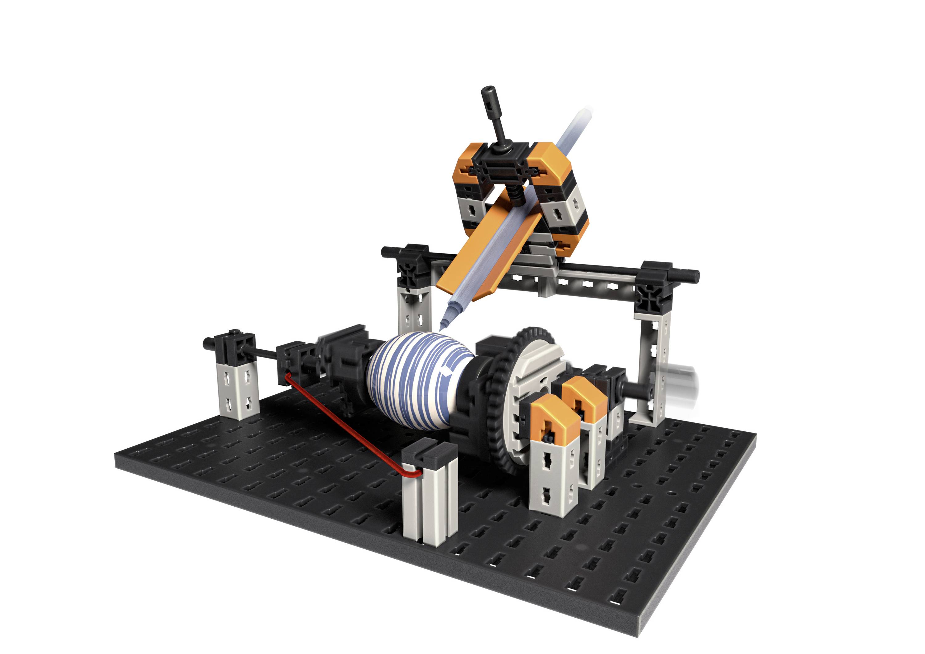 Un dispositif mécanique trace des motifs en spirale sur un cylindre rotatif. L'appareil est composé de pièces LEGO.