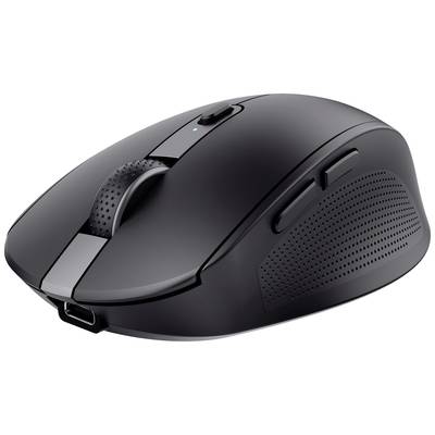 Souris d'ordinateur sans fil noire avec deux boutons latéraux et un design ergonomique, placée sur une surface blanche.