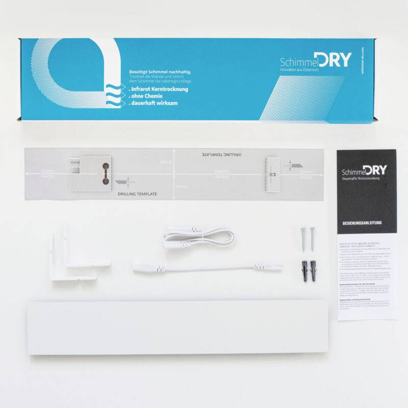 Emballage et contenu d'un kit anti-moisissures. Comprend un gabarit de perçage, des câbles, des vis et du matériel de montage. Notice d'instructions incluse.