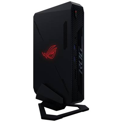 Boîtier de gaming noir et rouge avec logo lumineux, posé verticalement, montrant deux ports USB à l'avant. Design moderne.