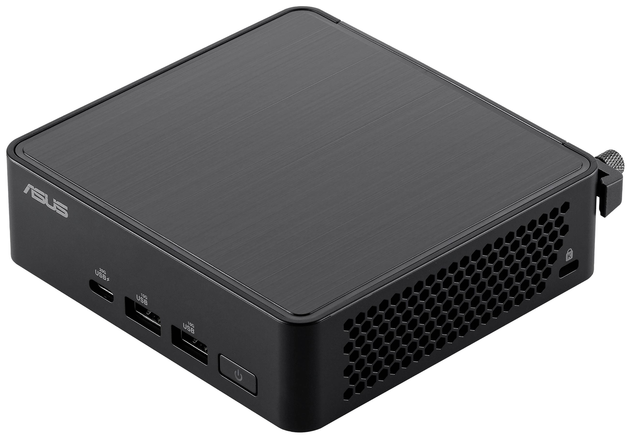 Un ordinateur compact noir avec des fentes de ventilation et plusieurs ports à l'avant.