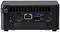 Vue arrière d'un mini-PC avec plusieurs ports : deux HDMI, deux USB-C, deux USB-A, Ethernet et entrée DC pour connecter des périphériques.